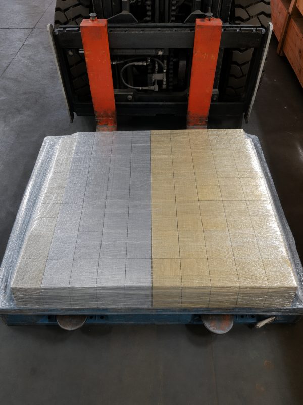 Shrink-wrapped pallet of metal stock ready for export at Seng Huat Metalplex